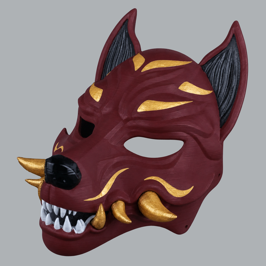 Kitsune fox mask in Merlot / Gold, three-quarter view facing left