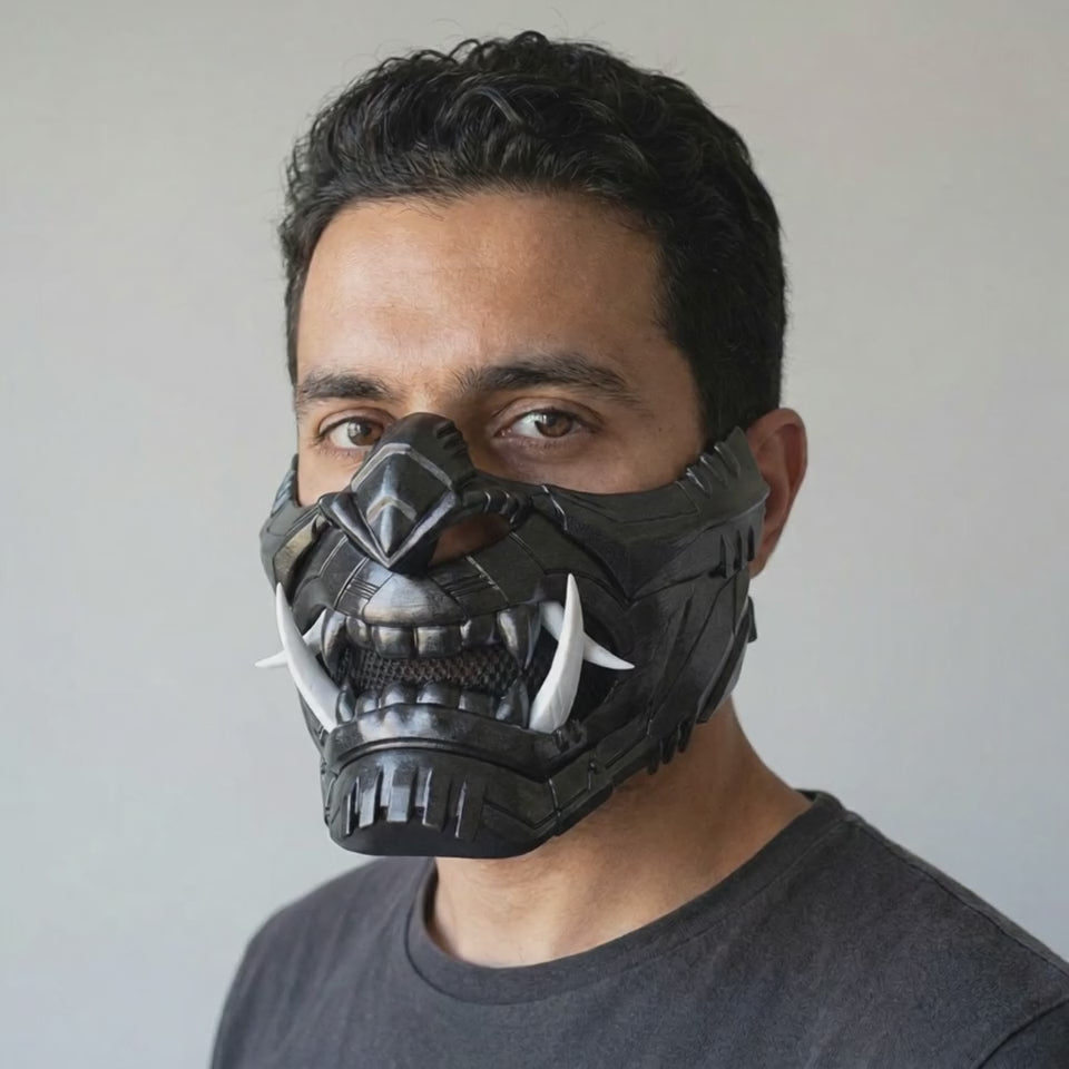 Cyber Oni Mask Metallic Black worn on a model