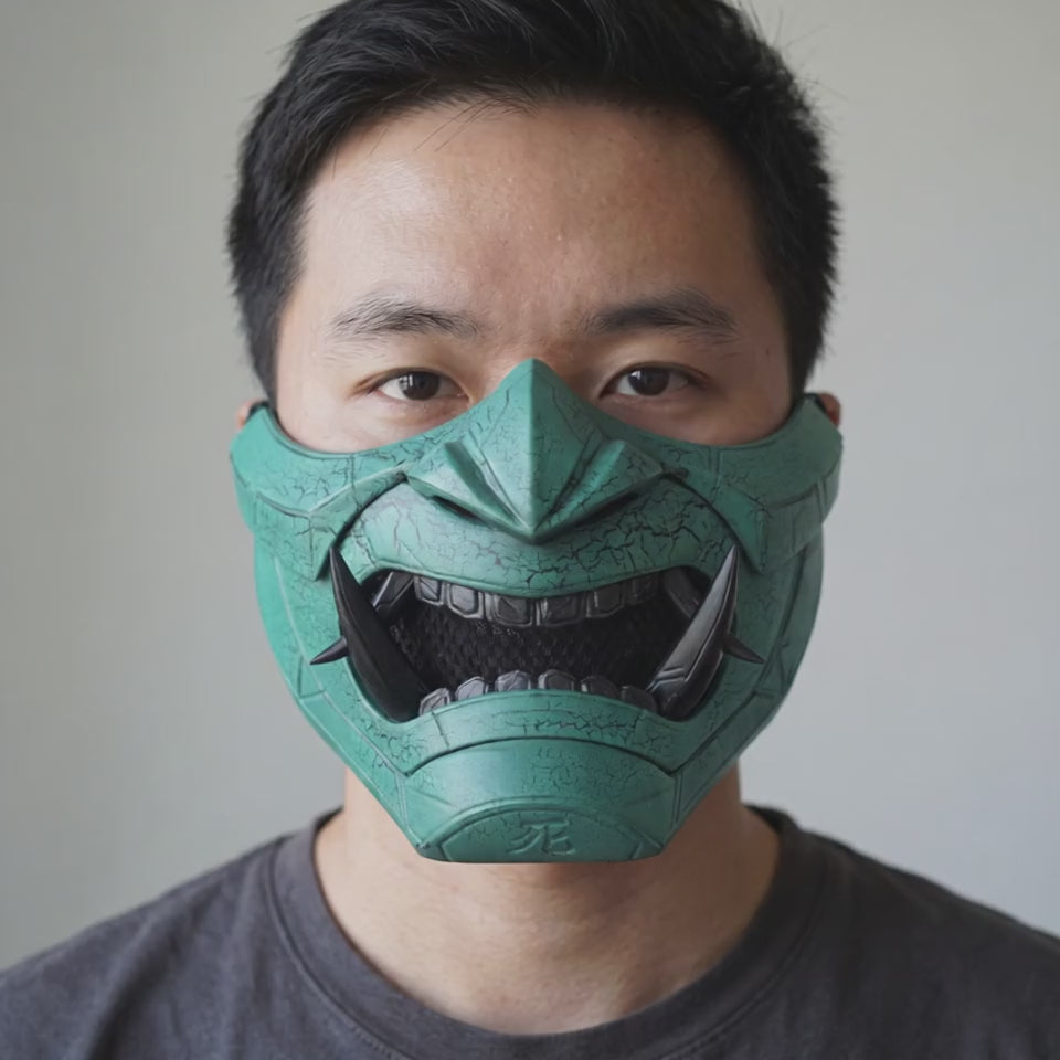 Cyberpunk Oni Mask - Cracked Effect Green/Black worn on a model