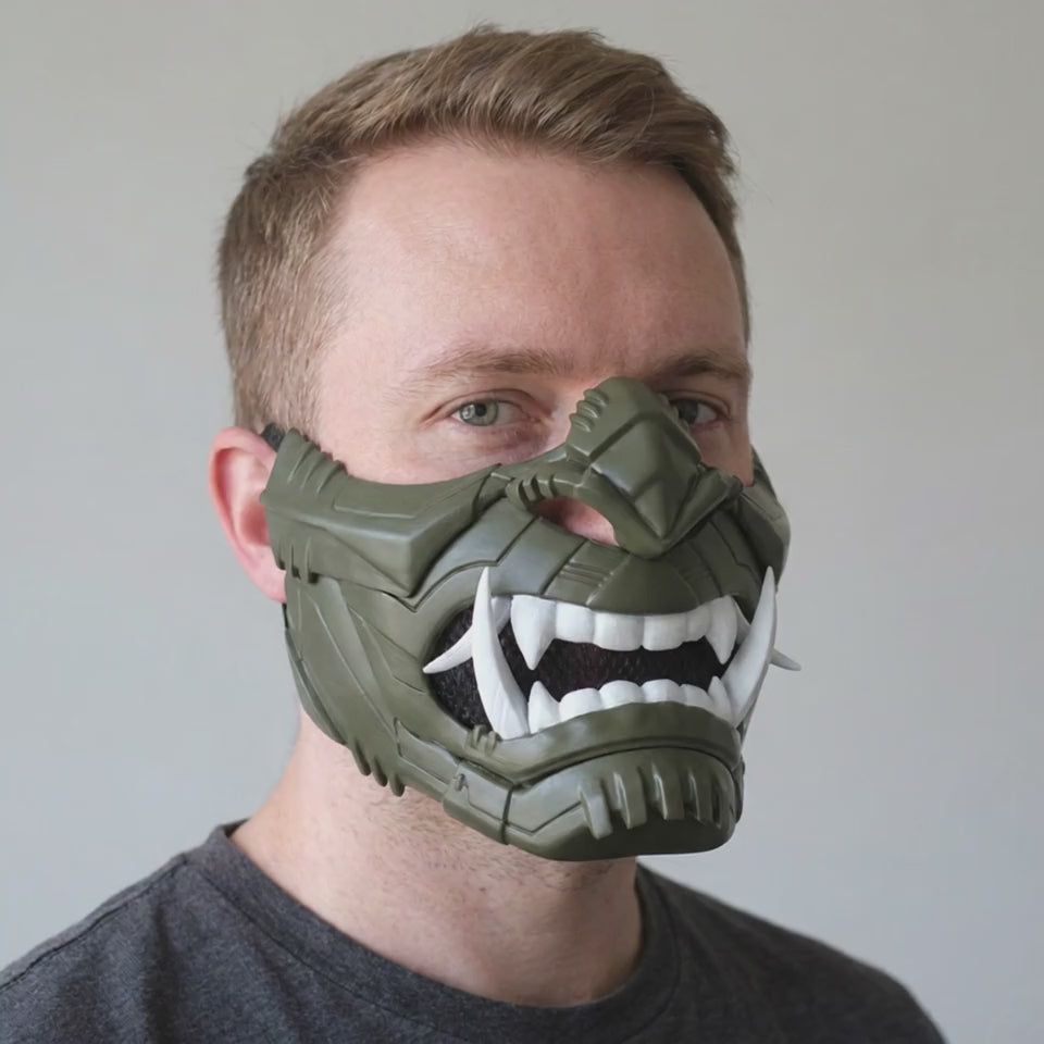 Cyber Oni Mask Army Green worn on a model